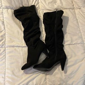 Knee high, memory foam heeled boots.